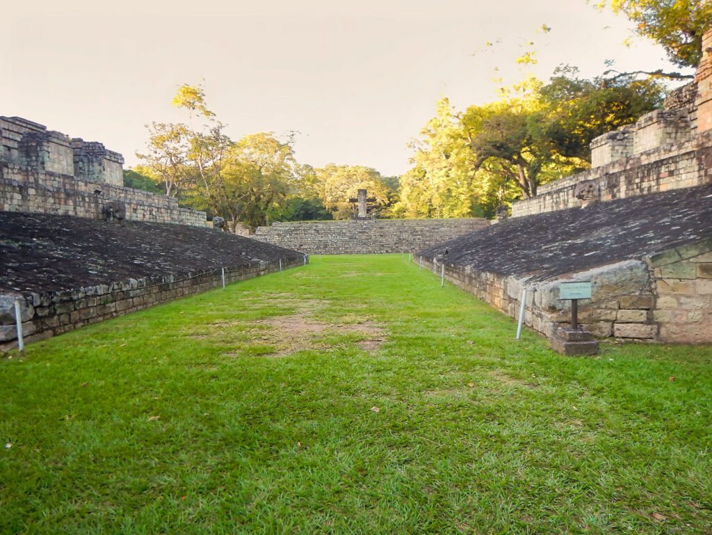 View of the ancient ball court at the Copán ruins during a Copán day tour from Guatemala City by air — part of a cultural adventure for travelers who fly from Guatemala to Copán.