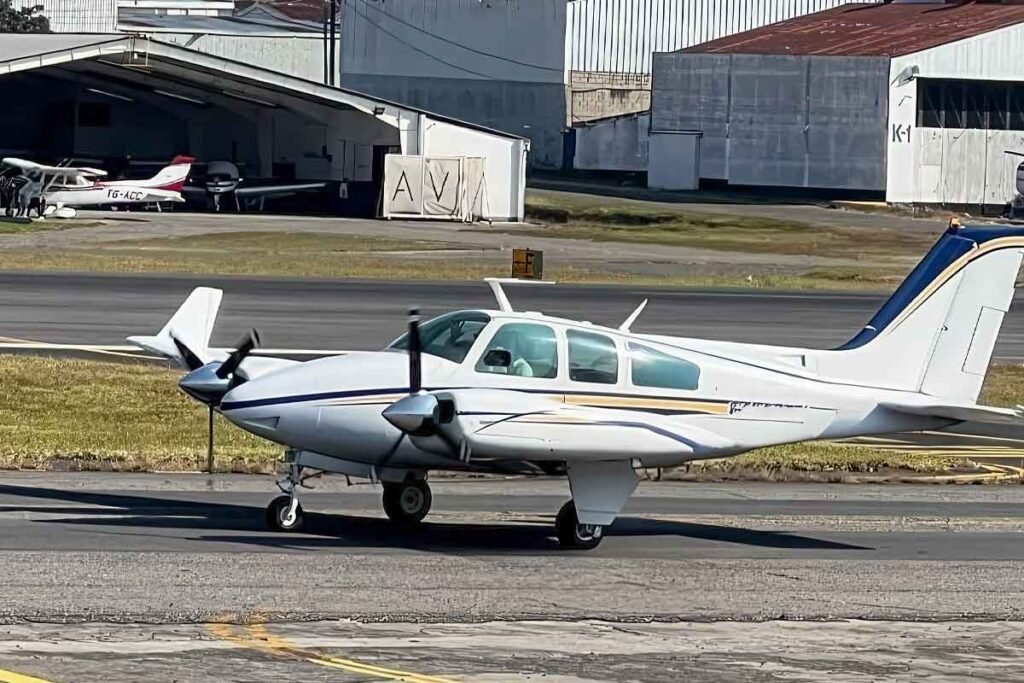 Fly Guatemala To Copan, Small plane on the runway, ready for takeoff on a Copán day tour from Guatemala City by air, offering travelers a fast and scenic journey to the UNESCO archaeological site.